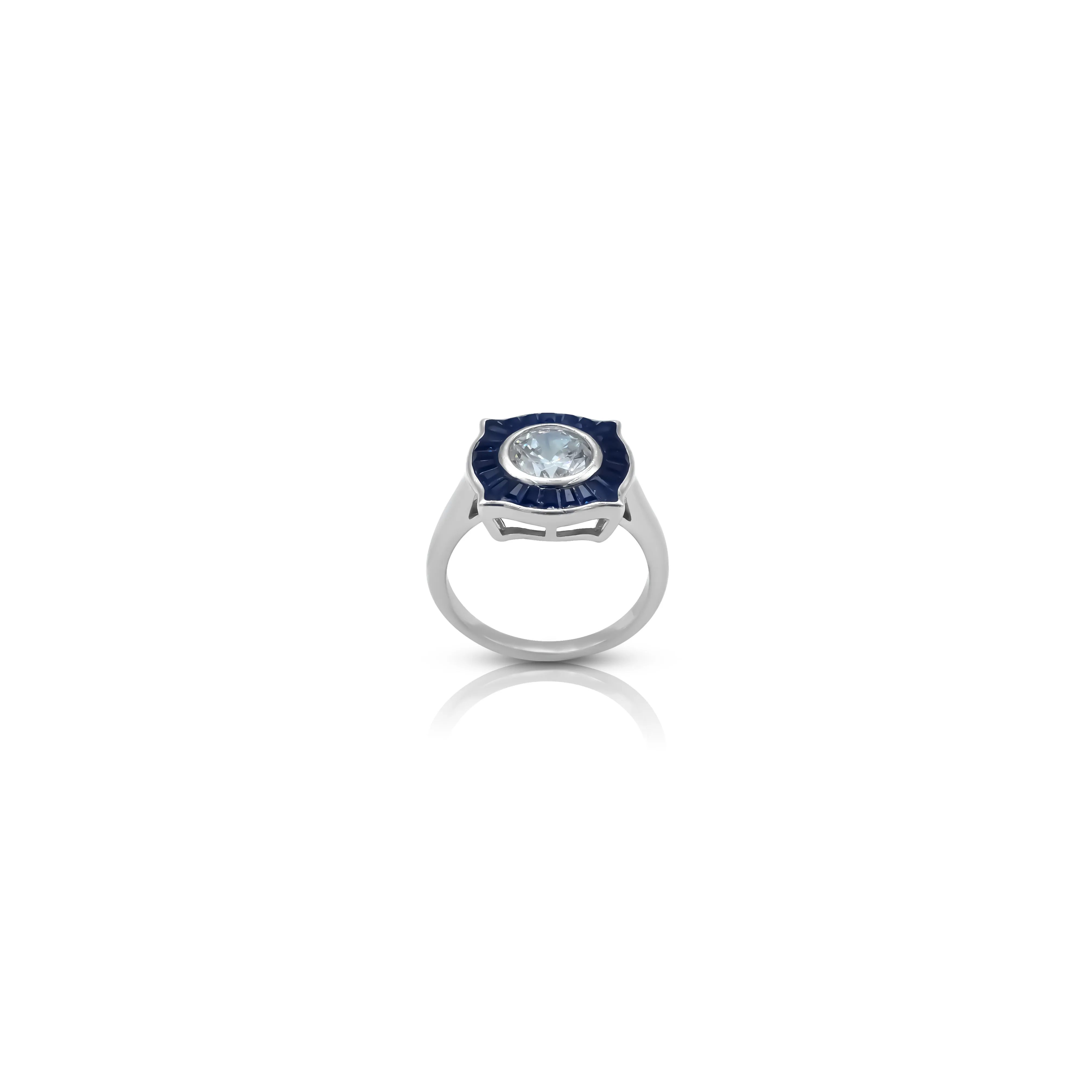 Silver Ring with Blue Stone Border and White Center Gem.